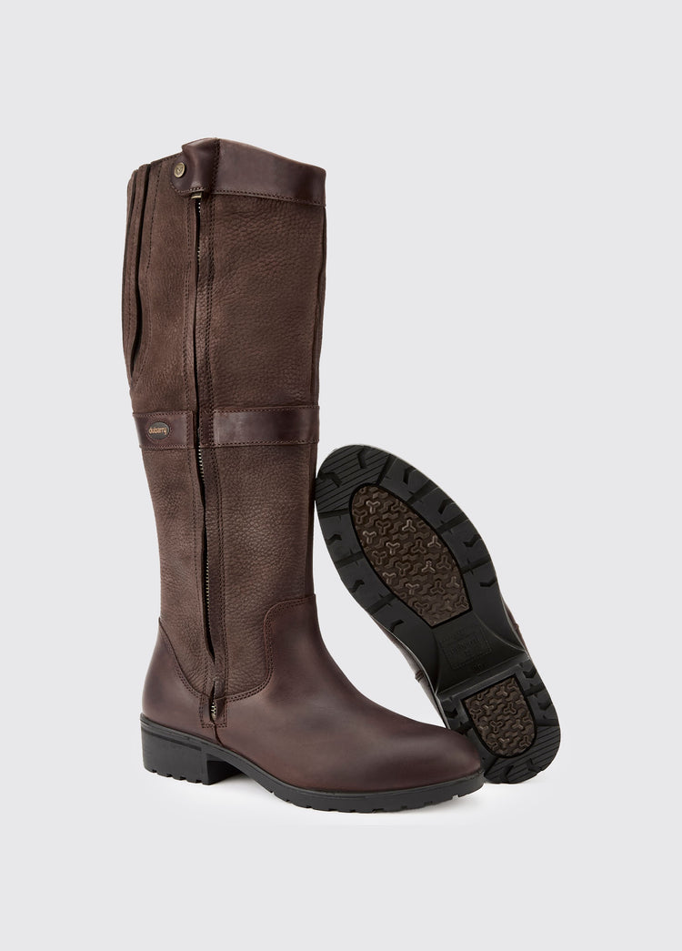 Pair of Dubarry knee-high java brown Sligo leather Country Boots with full zip with one boot sole showing