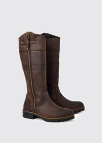 A pair of Dubarry Roundstone Country Boots, old rum coloured knee high heeled boots with full length zip and leather strap