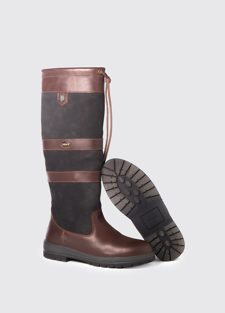 Dubarry ladies knee-high black and brown leather Galway Country Boot with laced top and narrower calf fit with one boot sole showing 