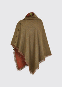 Dubarry women's Hazelwood Tweed Burren Poncho with brass coloured buttons on the side.