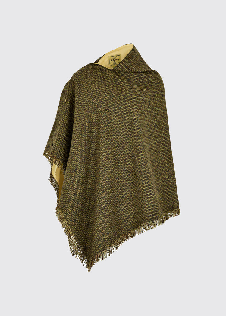Dubarry women's Hazelwood Tweed Heath Poncho. A poncho coated with wool and buttons on one side.