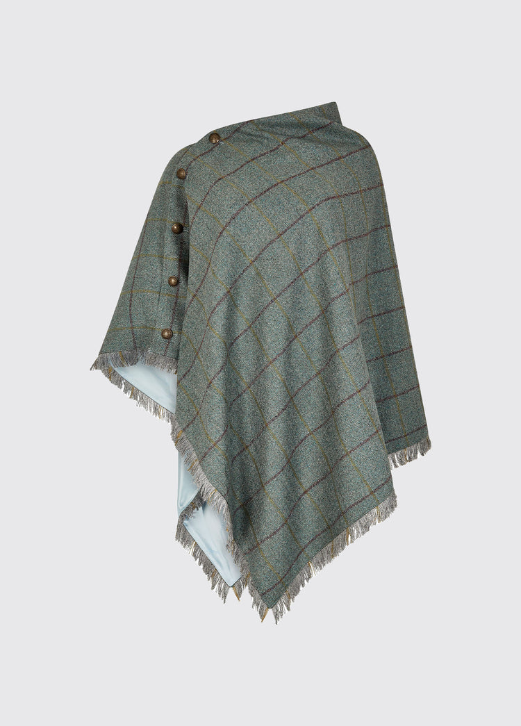 Dubarry women's Hazelwood Sorrel Poncho with smart brass coloured buttons and fabric fringe.