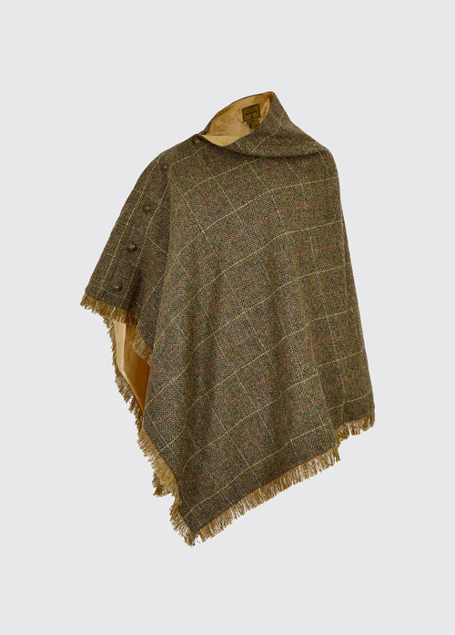 Dubarry women's Hazelwood Tweed thistle Poncho with brass coloured buttons on the side.