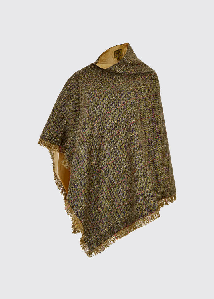 Dubarry women's Hazelwood Tweed thistle Poncho with brass coloured buttons on the side.