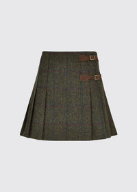 Dubarry women's Blossom Tweed Skirt in the colour Hemlock. A pleated skirt with a polo and light knit and two buckled leather tabs.