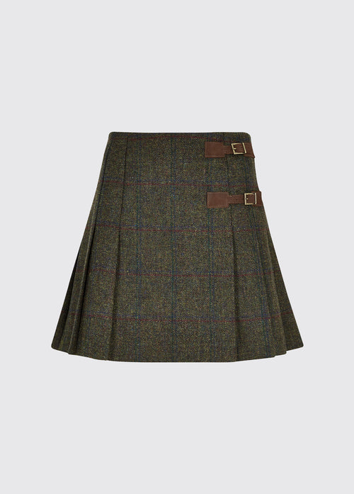 Dubarry women's Blossom Tweed Skirt in the colour Hemlock. A pleated skirt with a polo and light knit and two buckled leather tabs.