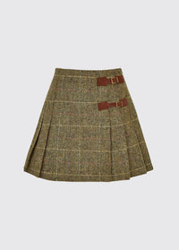 Dubarry women's Blossom Tweed Thistle Skirt with stitched-down knife pleats on each side and two buckled leather tabs.
