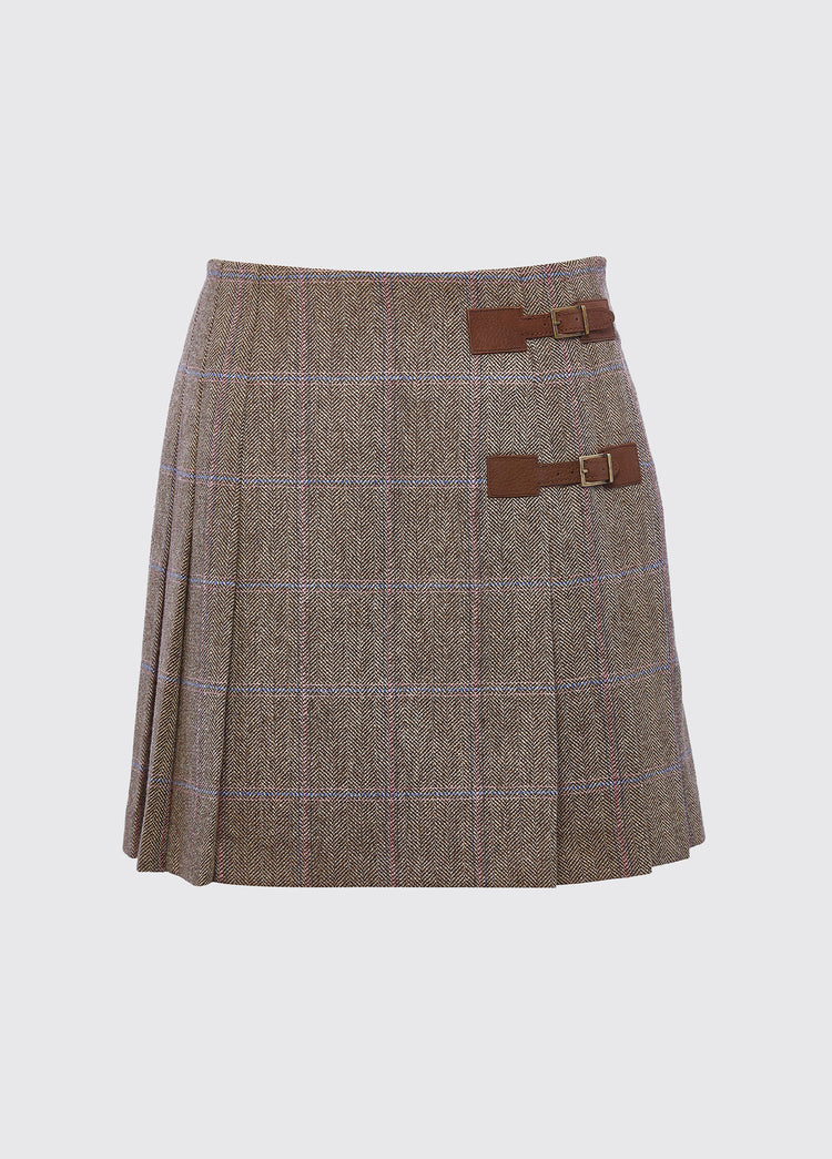 Dubarry women's Blossom Tweed Skirt in the colour WoodRose. A pleated skirt with a polo and light knit and two buckled leather tabs.