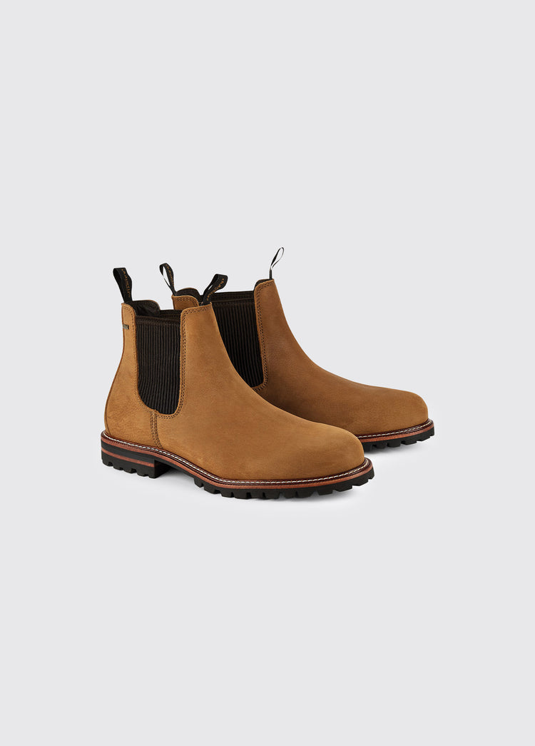 A pair of Dubarry Offaly ankle boots, brown men's seude look cleated chelsea boots with elasticated side gussets and leather finger pulls 