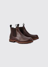 A pair of Dubarry Offaly ankle boots, mahogany brown coloured men's seude look cleated chelsea boots with elasticated side gussets and leather finger pulls 