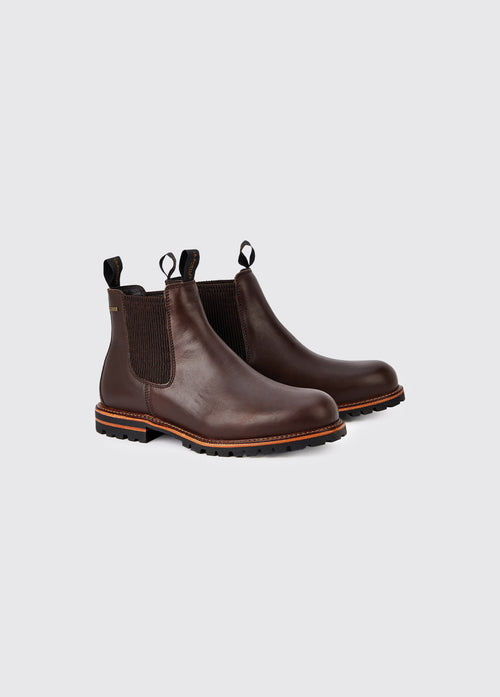 A pair of Dubarry Offaly ankle boots, mahogany brown coloured men's seude look cleated chelsea boots with elasticated side gussets and leather finger pulls 