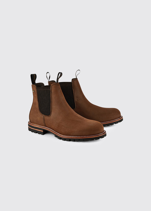 A pair of Dubarry Offaly ankle boots, walnut brown coloured men's seude look cleated chelsea boots with elasticated side gussets and leather finger pulls 