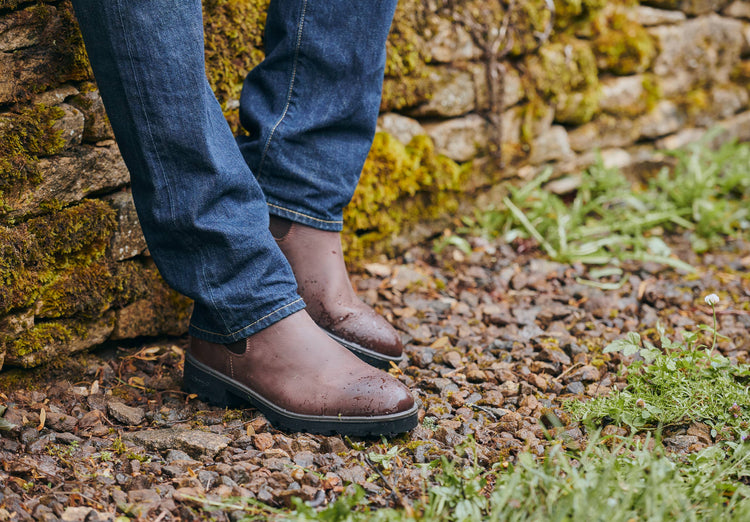 On Model image of a man wearing a pair of Dubarry Antrim Old Rum coloured leather country boots, men's Chelsea style boot