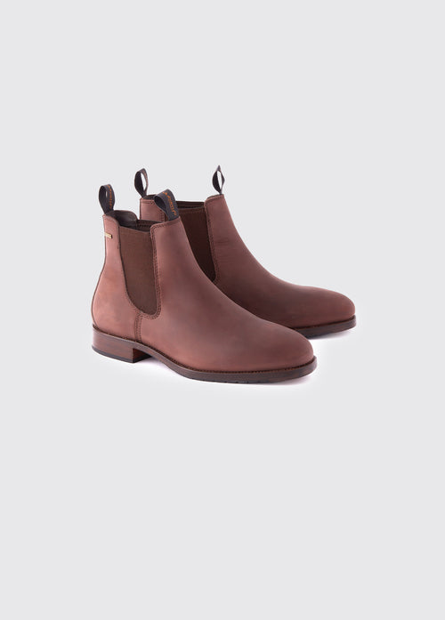 A pair of Dubarry Kerry Chelsea ankle boots for men, old rum brown coloured leather with elasticated side gussets with front and heel finger pulls