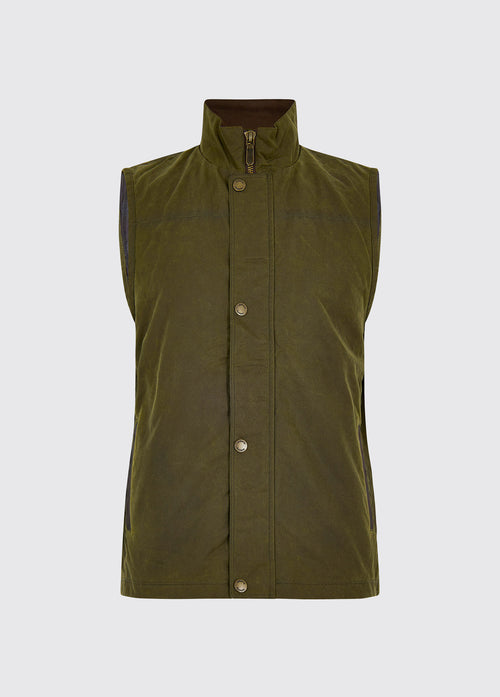 Waist up view of a Dubarry Mayfly wax gilet jacket for men, fennel coloured gilet with full zip closed with buttons along the zip. 