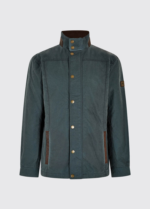 Waist up view of a male model wearing a Dubarry Carrickfergus waxed jacket open, dark pebble green blue coloured with a standing collar and buttons along the full zip and lighter brown inside collar