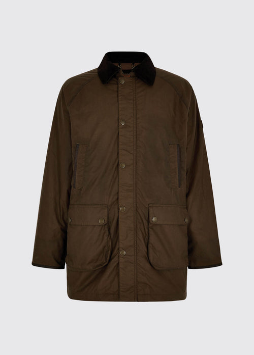 A Dubarry Brunswick Wax Jacket, ginger brown coloured longer length jacket with a dark corduroy collar and full zip and buttons. The jacket has multiple pockets