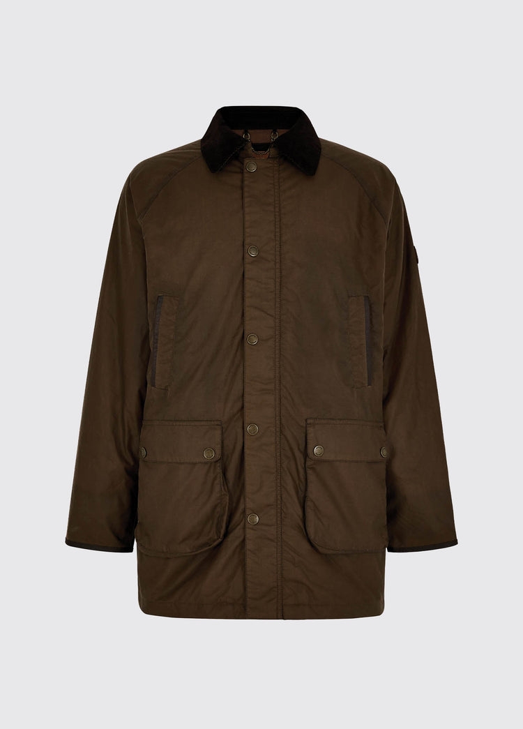 A Dubarry Brunswick Wax Jacket, ginger brown coloured longer length jacket with a dark corduroy collar and full zip and buttons. The jacket has multiple pockets